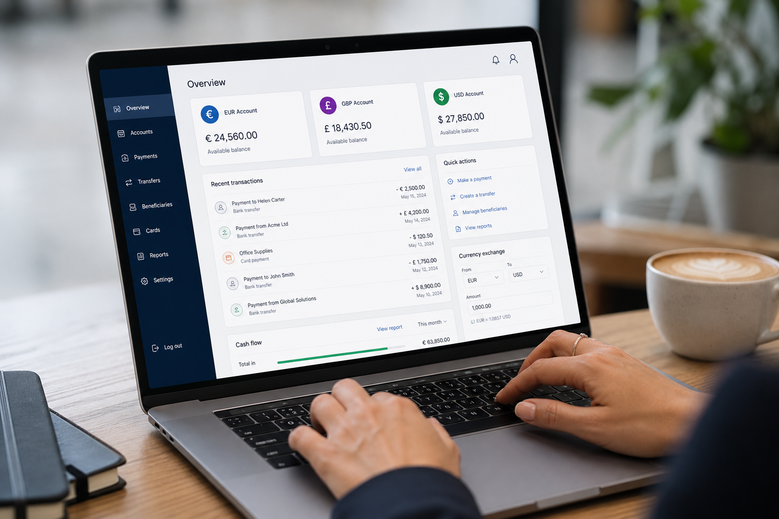 Business user managing multi-currency balances on the FluxRemit dashboard from a laptop